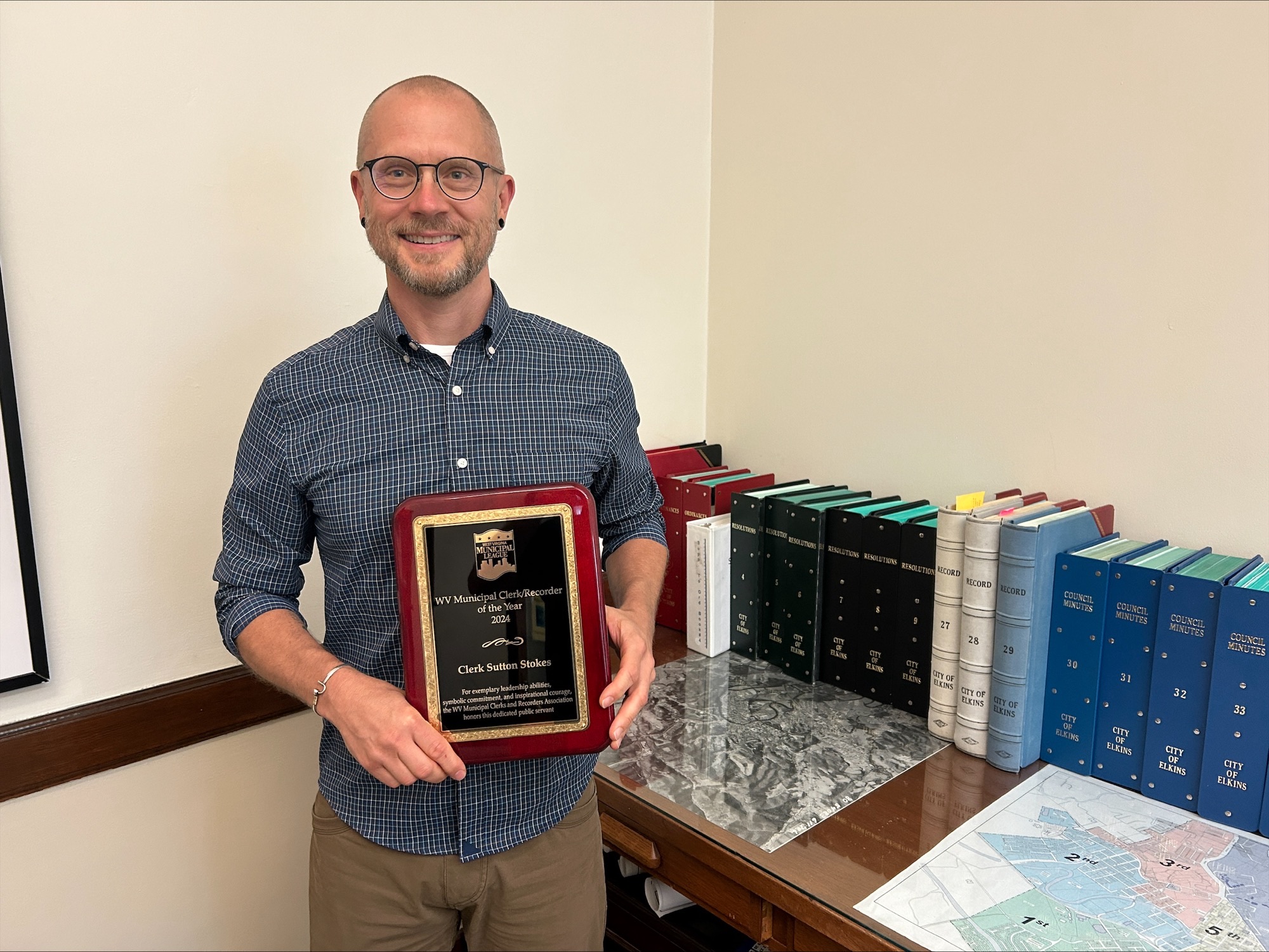 Sutton Stokes Holding Clerk of the Year Award