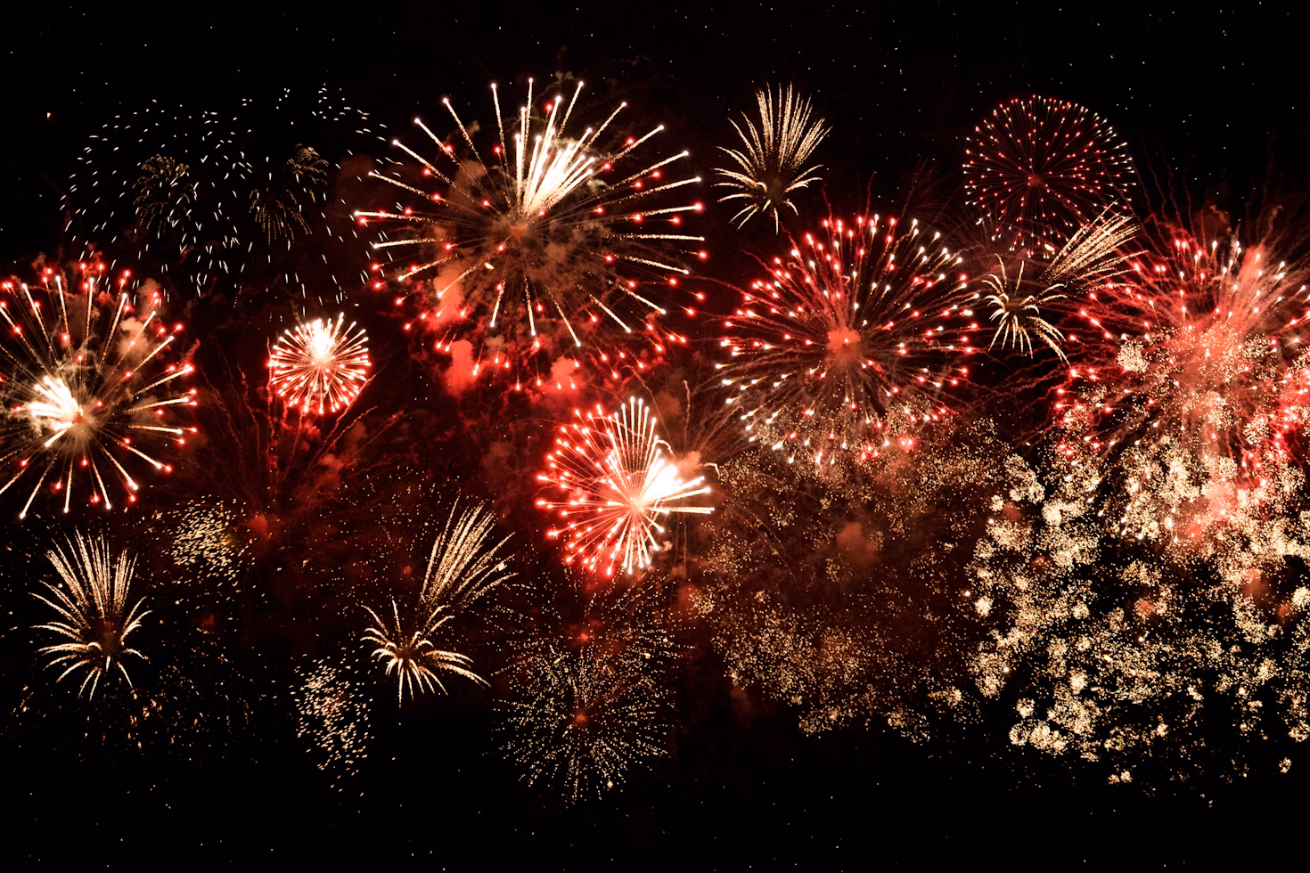 an image of fireworks in a night sky. From Unsplash.com